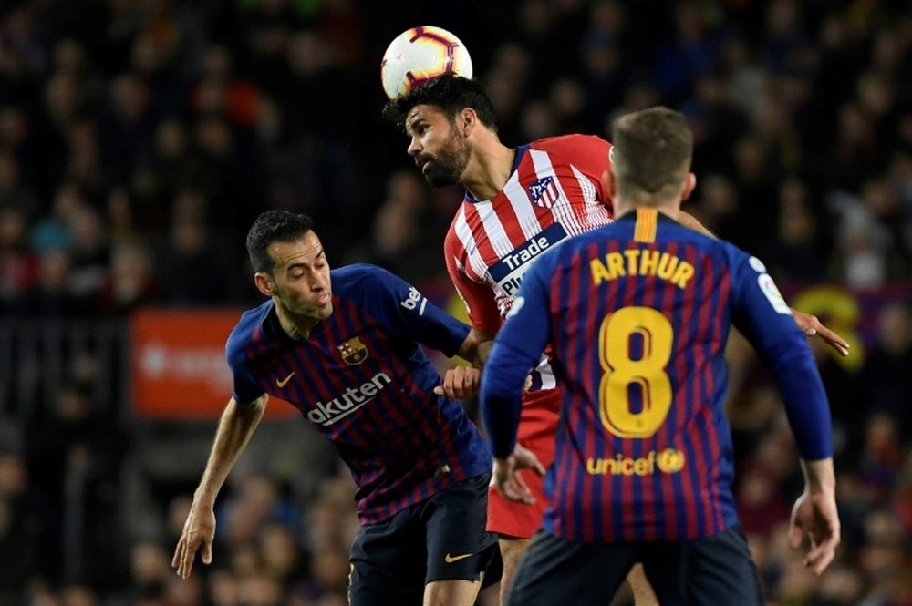 Diego Costa (c), lors du match de Liga face à Barcelone. AFP