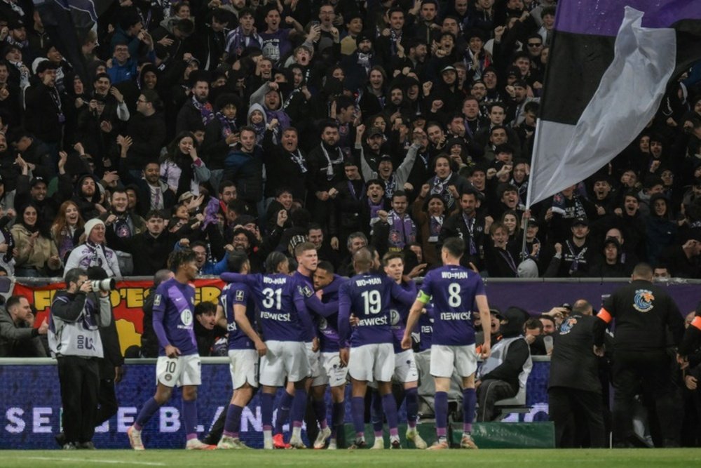 Les joueurs de Toulouse avec leur flocage WO=MAN lors du match nul contre Monaco. AFP
