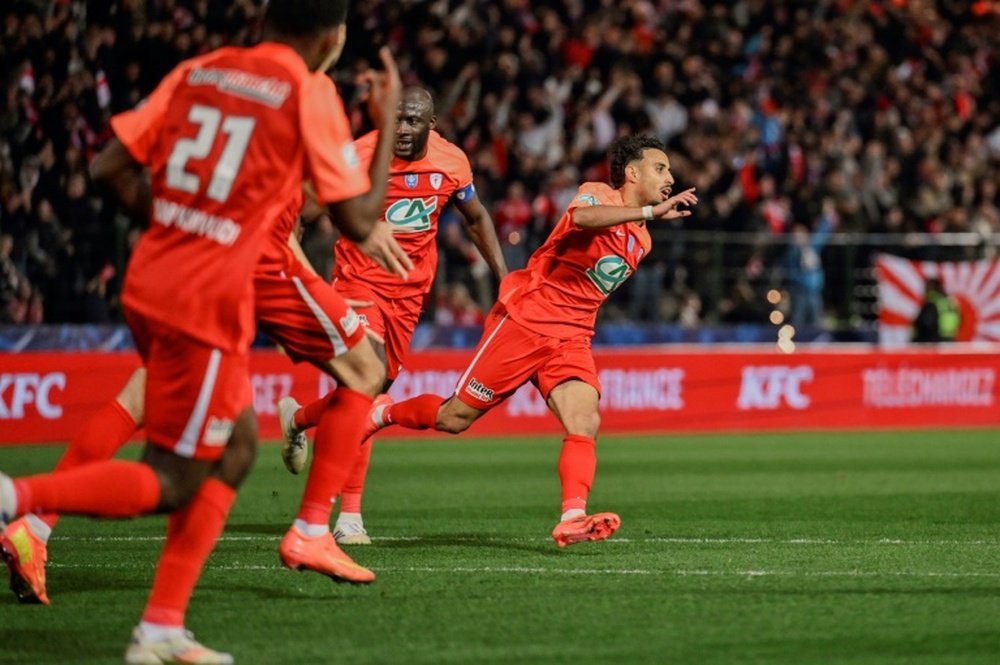 Le Cannois Chafik Abbas (C) lun des buteurs de la qualification. AFP