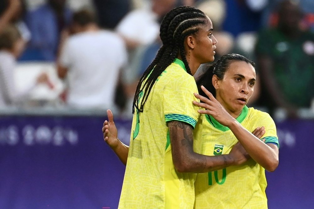 Le Brésil de Marta au défi des Etats-Unis du trio Rodman-Smith-Swanson. AFP
