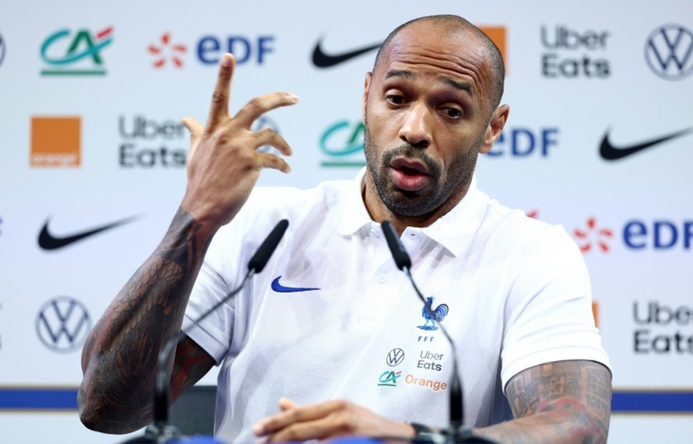 'Revenir ici en tant que coach, c'est juste fou', savoure Henry. AFP