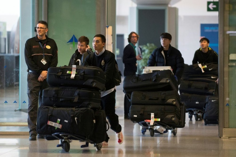 Les footballeurs du Wuhan Zall de retour en Chine et placés en isolement. AFP