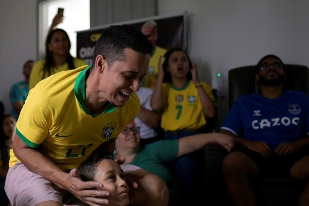 Mondial: la famille de Richarlison dépitée mais fière de Charlinho. AFP