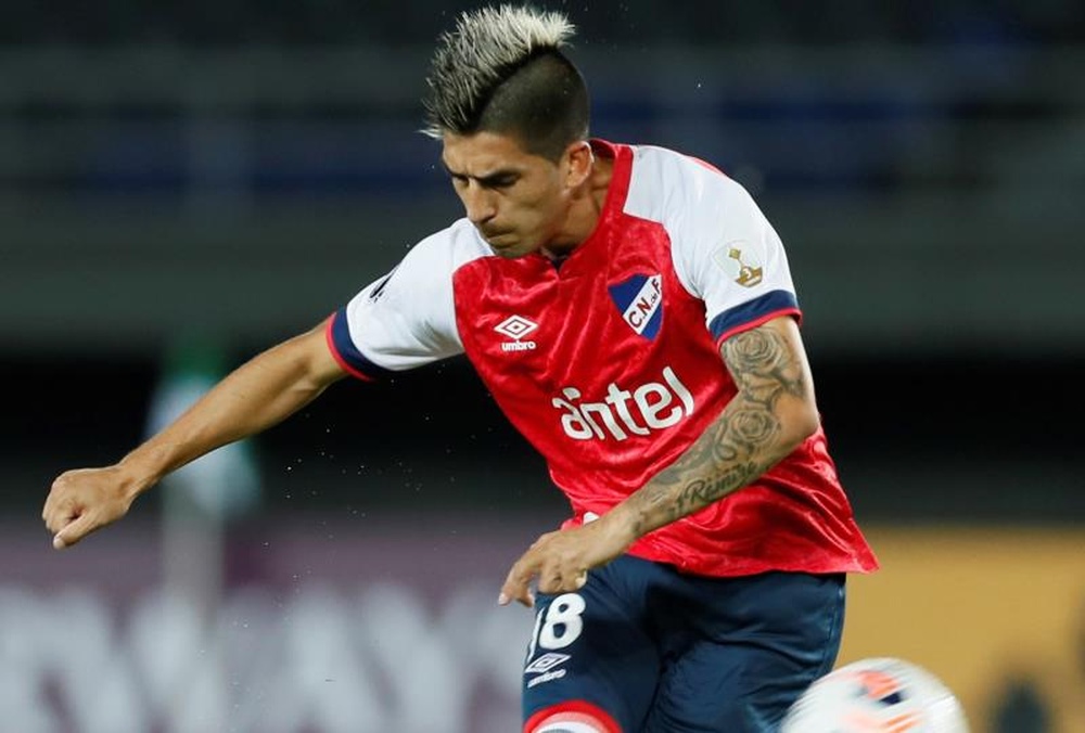 Nacional ganó un partido agónico. EFE