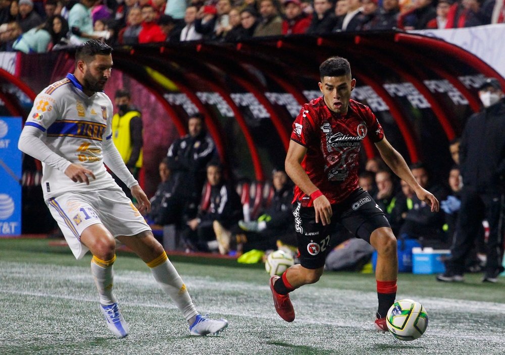 Gignac permitió que Tigres siga líder. EFE