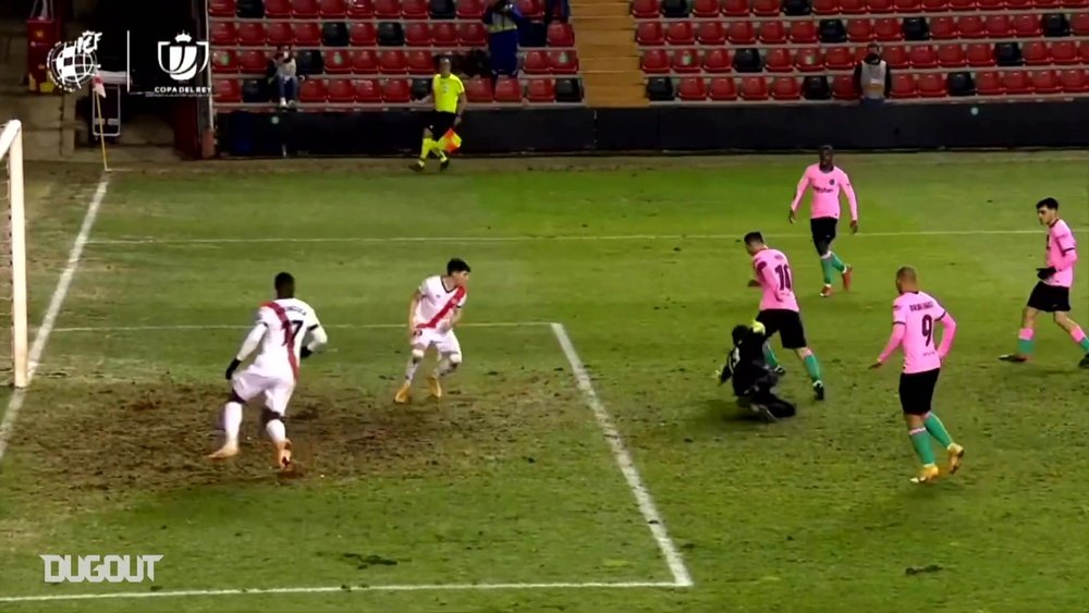 Messi dribbles past keeper and defender inside the box. DUGOUT