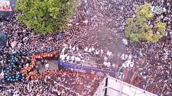 Take a look at Inter's bus parade as they celebrate their 20th Serie A title on the streets of Milan.