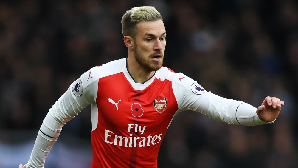 Aaron Ramsey kicking the ball for Arsenal. Goal