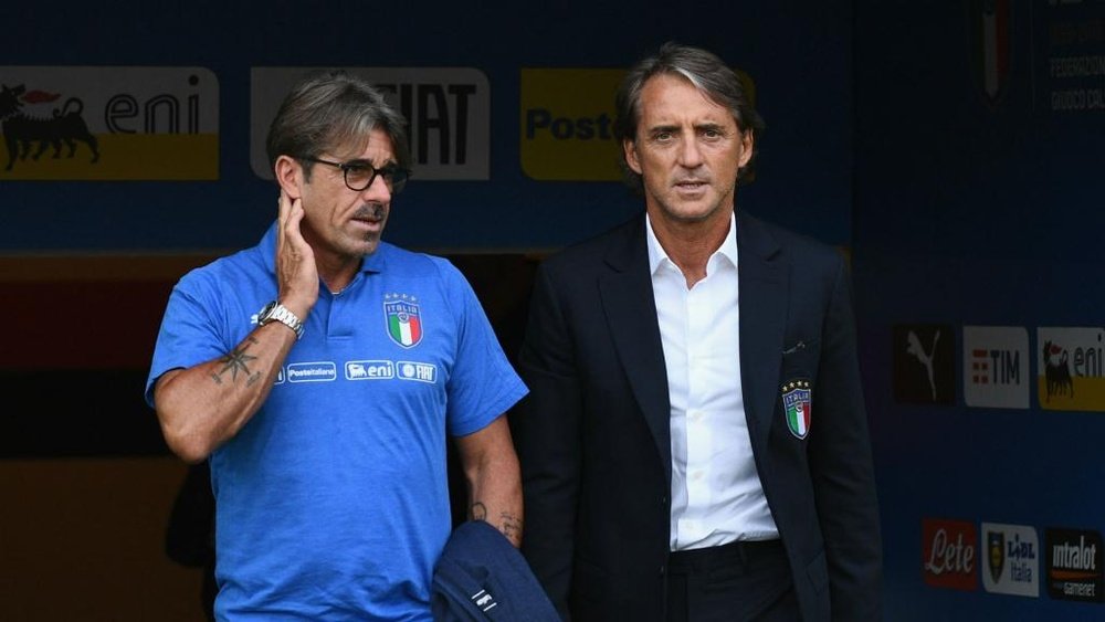 Self-isolating Mancini conducted Italy's triumph over Estonia, reveals stand-in Evani. AFP