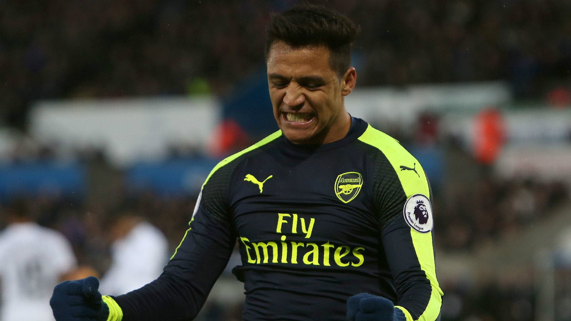 Alexis Sanchez célèbre un but avec Arsenal en Premier League. AFP