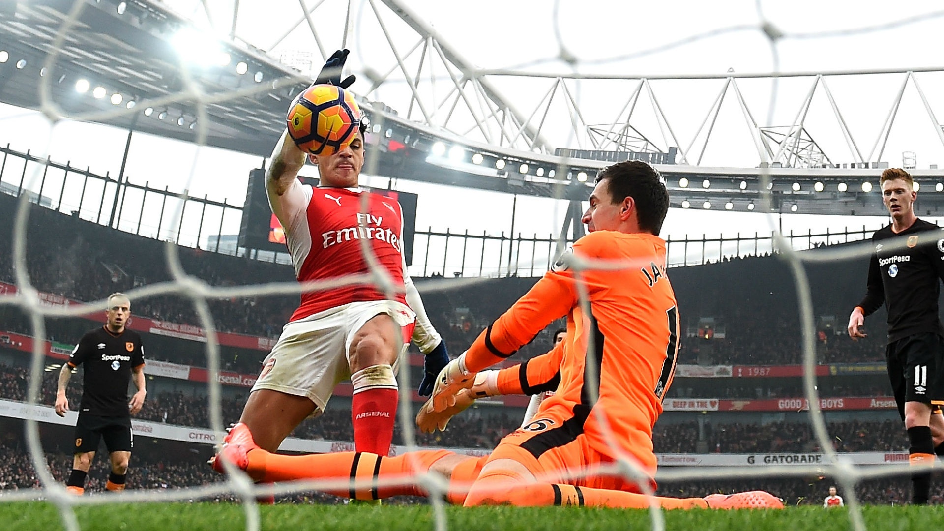 Arsenal 2 Hull City 0: Sanchez lends Wenger a helping hand