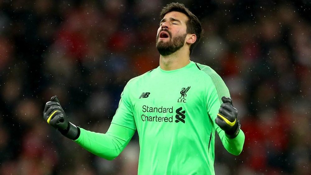 Liverpool blow as Alisson goes off injured in opening Premier League game. GOAL