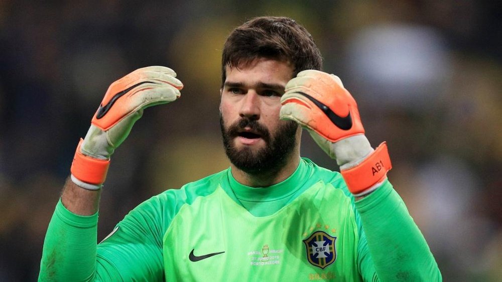 Alisson played a key part as Brazil beat Paraguay on penalties. GOAL