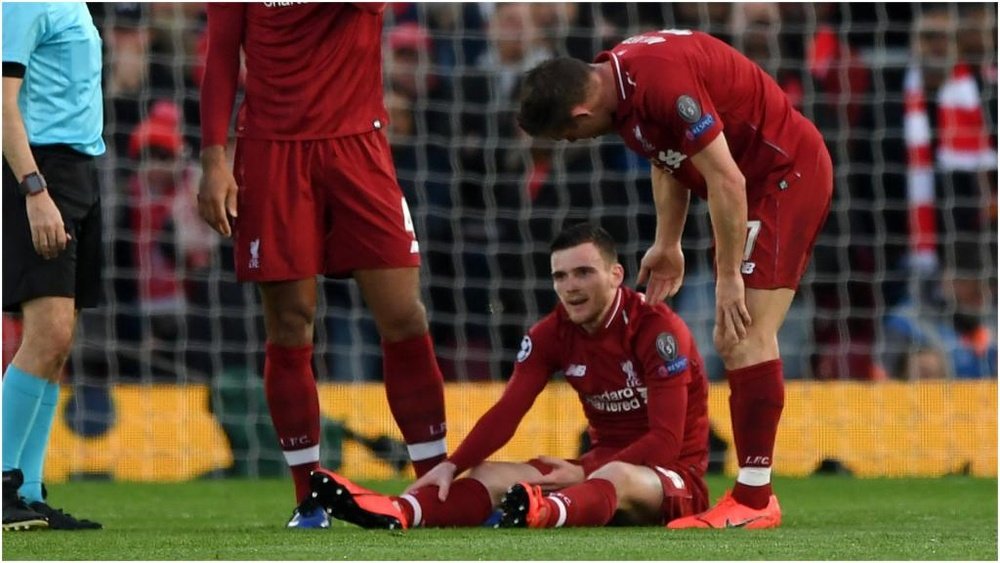 Andrew Robertson went down injured in the first half