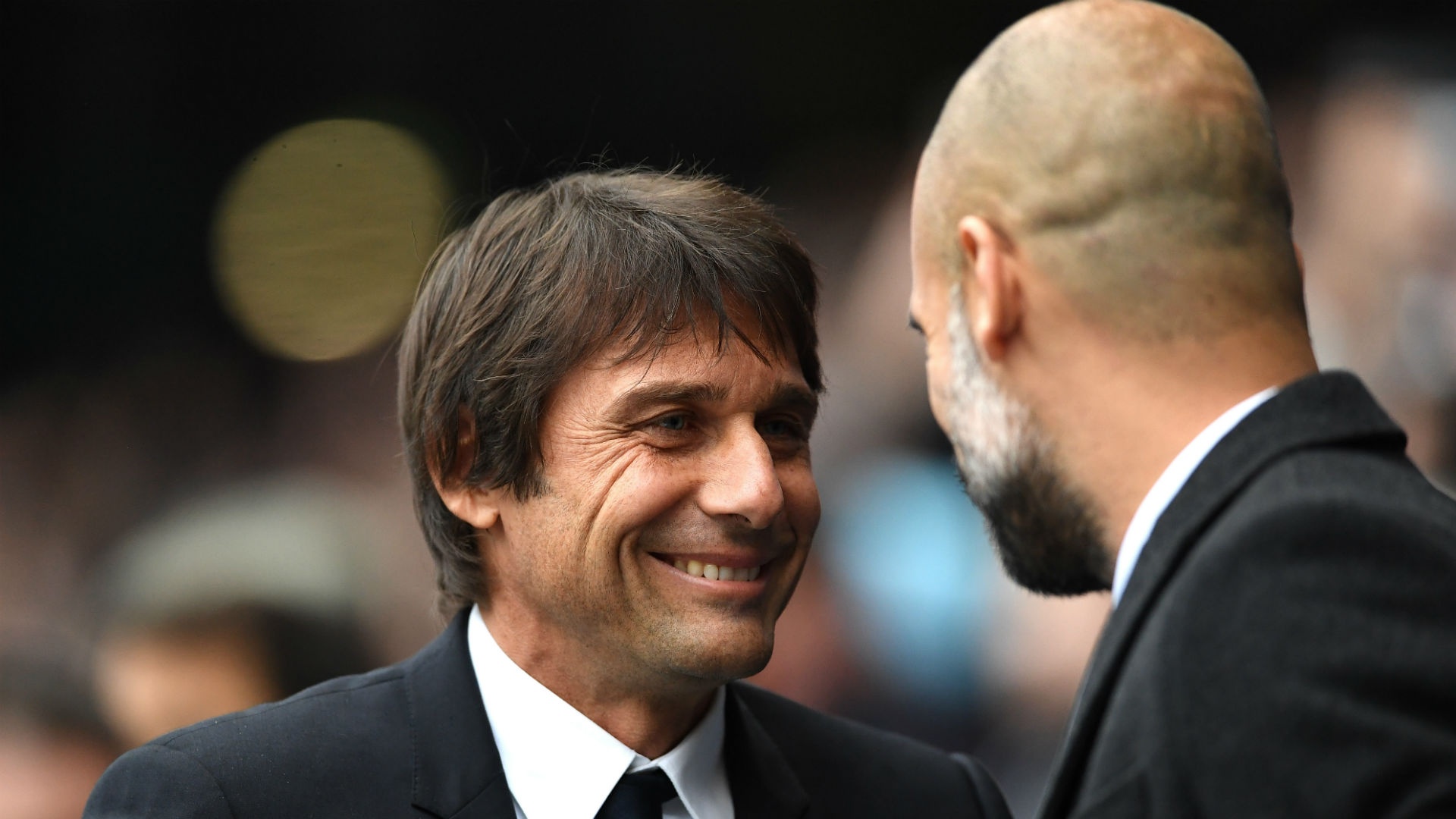 Antonio Conte (L) has adapted to the Premier League easier than Man City manager Pep Guardiola. Goal