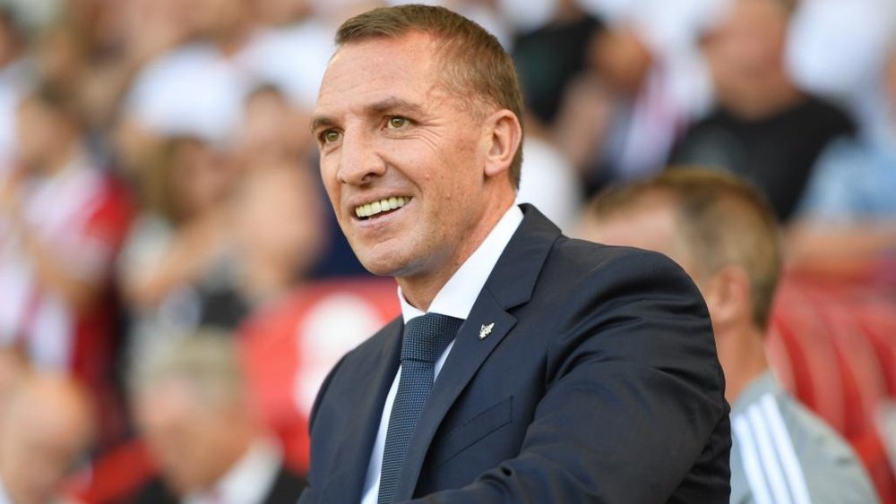 Brendan Rodgers denies he wants to leave Leicester to join Arsenal. GOAL
