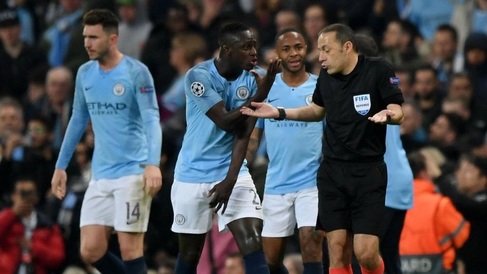 Benjamin Mendy argues with referee over Sterling's disallowed goal. GOAL
