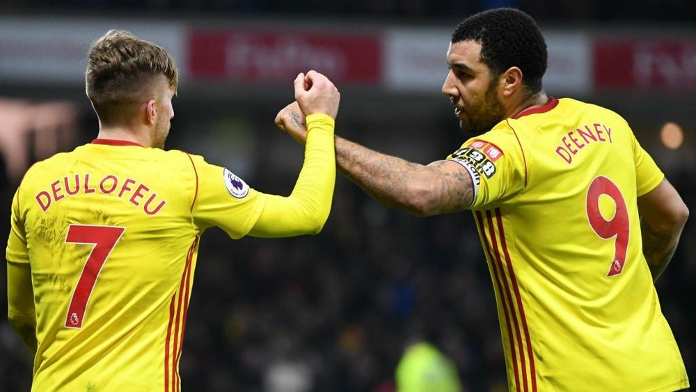 Deeney will not be punished for raising his middle finger towards Chelsea fans. GOAL