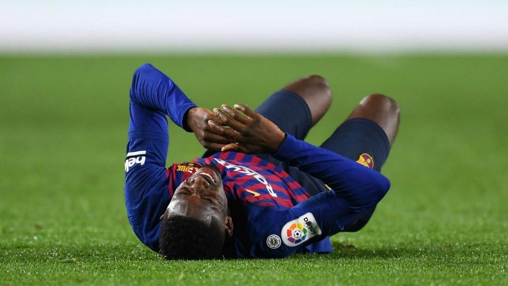 Barcelona forward Dembele set for tests on sprained ankle. Goal