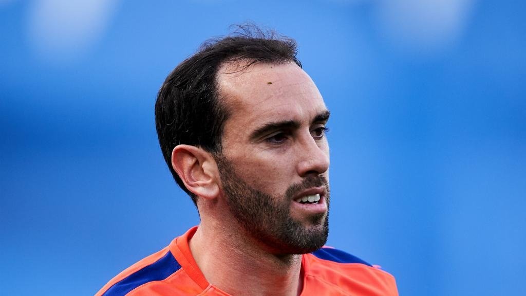 Godin misses Atletico training with thigh injury