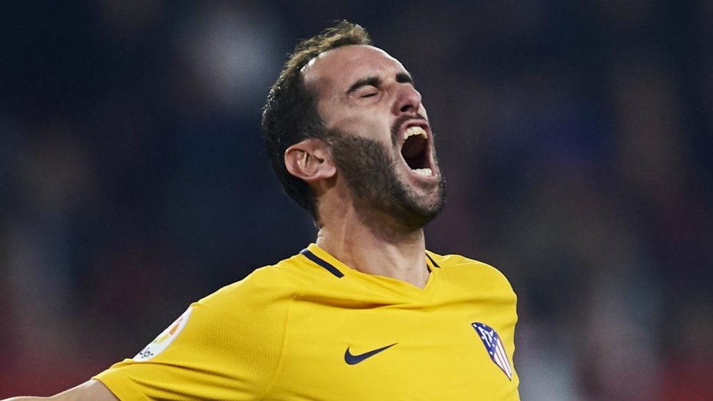 Simeone to call on 'tough' Godin for Copenhagen trip