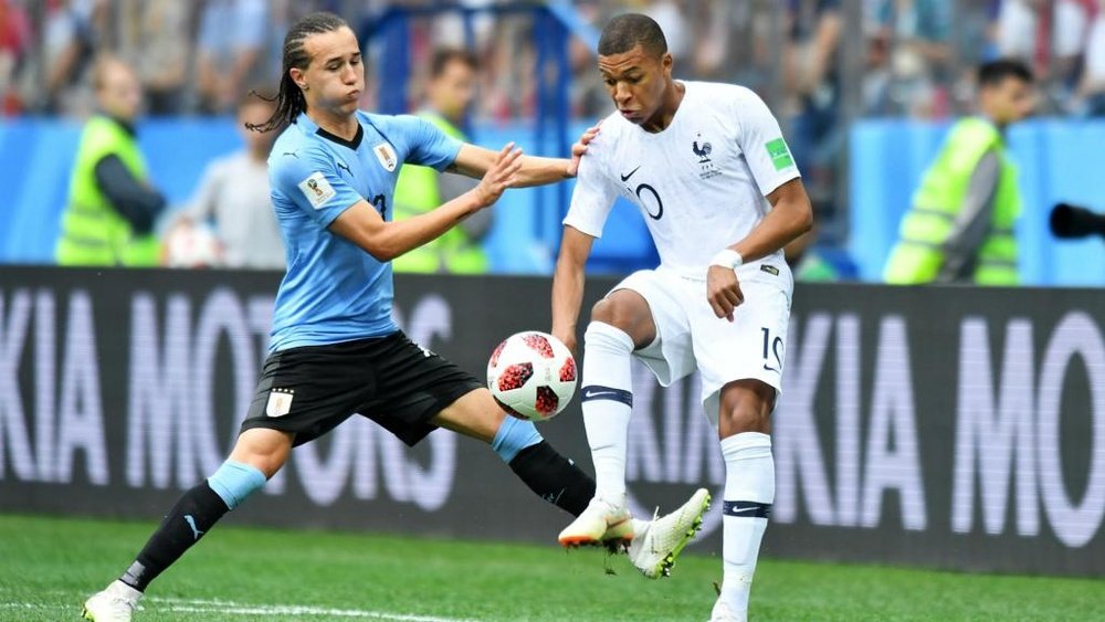 Diego Laxalt Kylian Mbappe Uruguay France World Cup. Goal