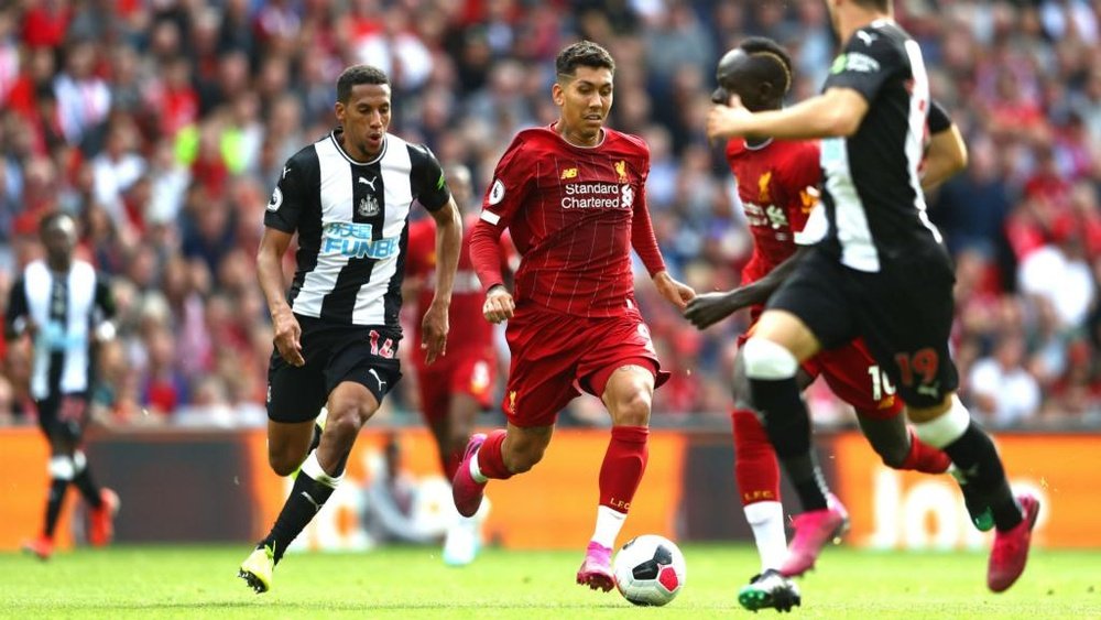 Van Dijk was full of praise for Firmino after Liverpool's win over Newcastle. GOAL