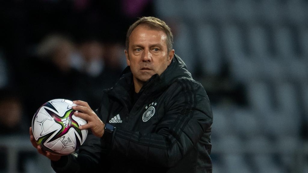 Flick hopes Germany players take up vaccination offer. AFP