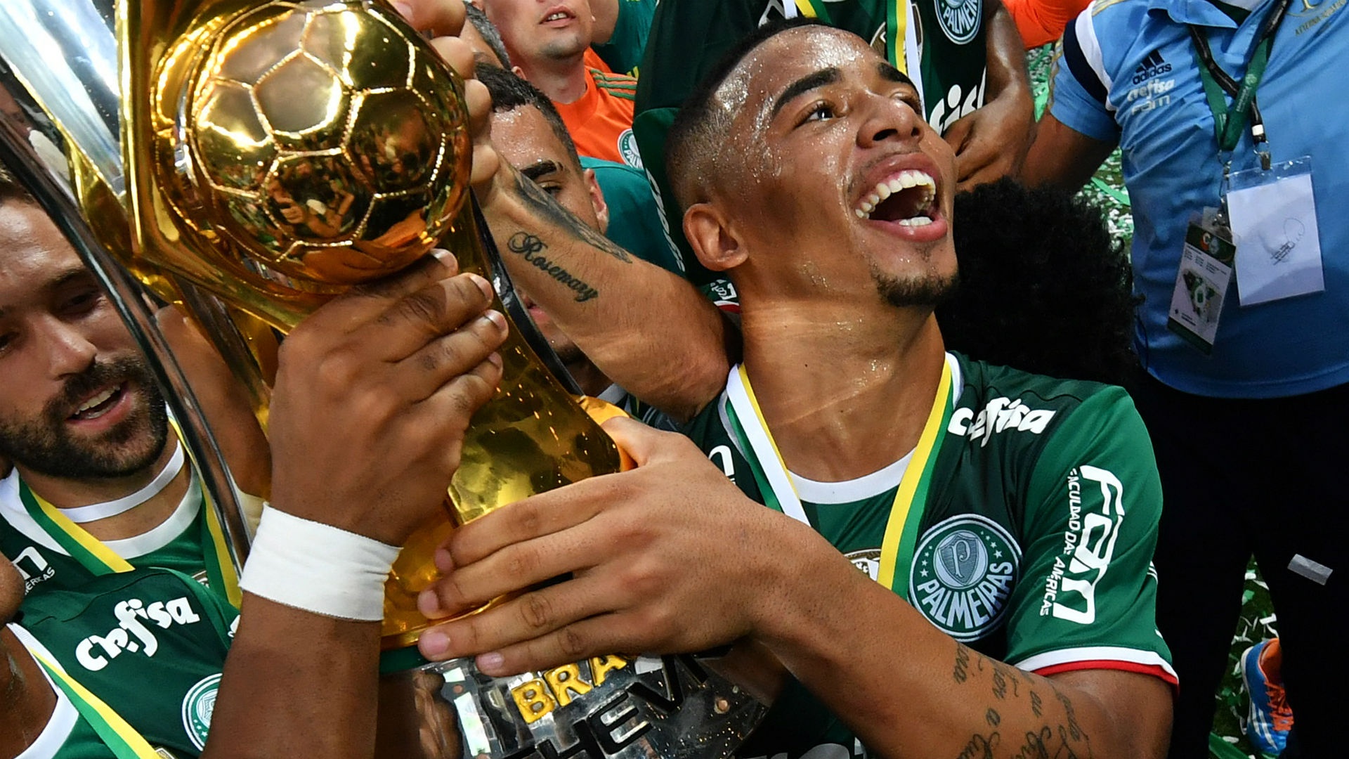 Gabriel Jesus holding a trophy. Goal