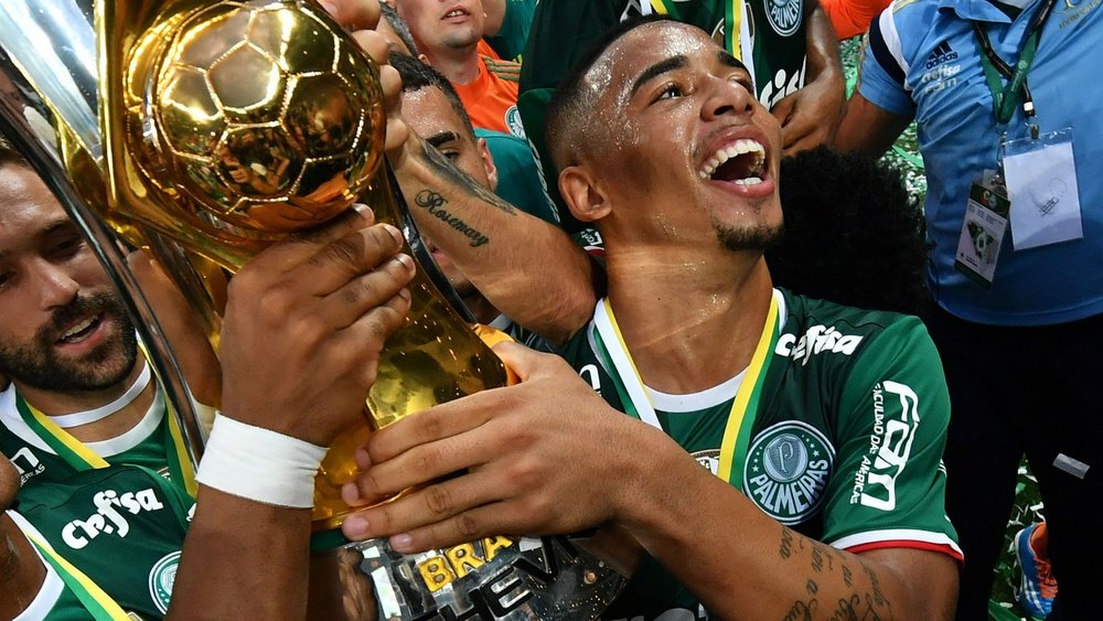 Gabriel Jesus holding a trophy. Goal