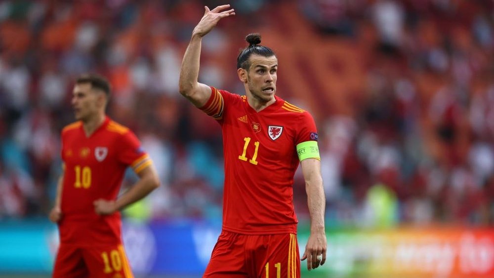 Bale has a hunger and desire to play for Wales, insists Page. AFP