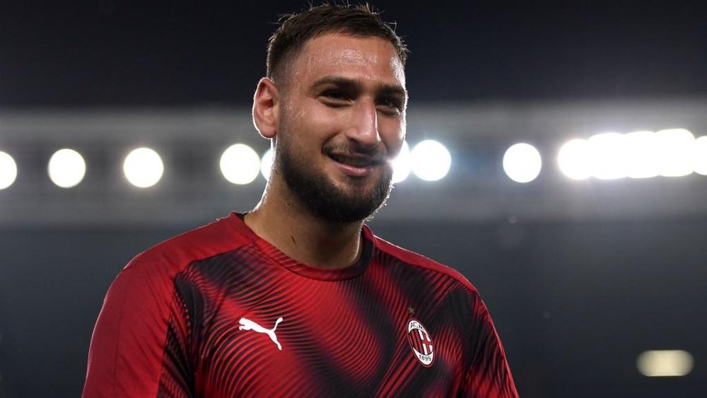 Donnarumma focused on Milan amid transfer rumours. AFP