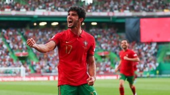 Guedes and Cancelo goals seal Portugal victory. GOAL