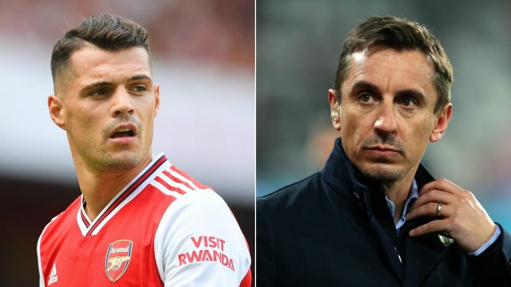 Gary Neville (R) says Xhaka (L) has to develop a thick skin and accept fan criticism. GOAL