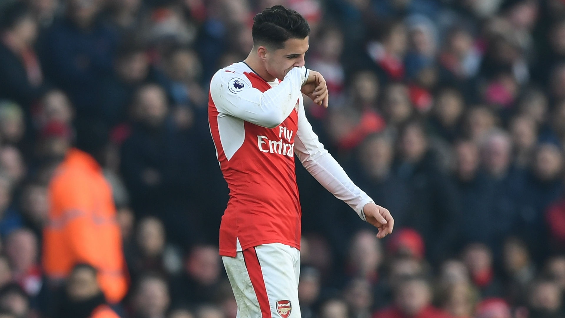 Granit Xhaka walking off the pitch after seeing the red card. Goal
