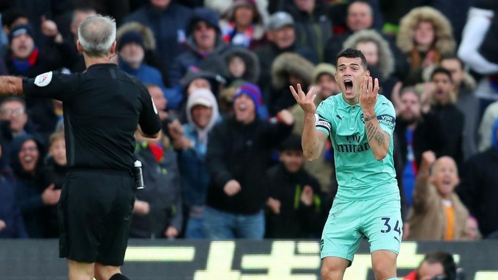 Xhaka admitted to having fouled Zaha. GOAL