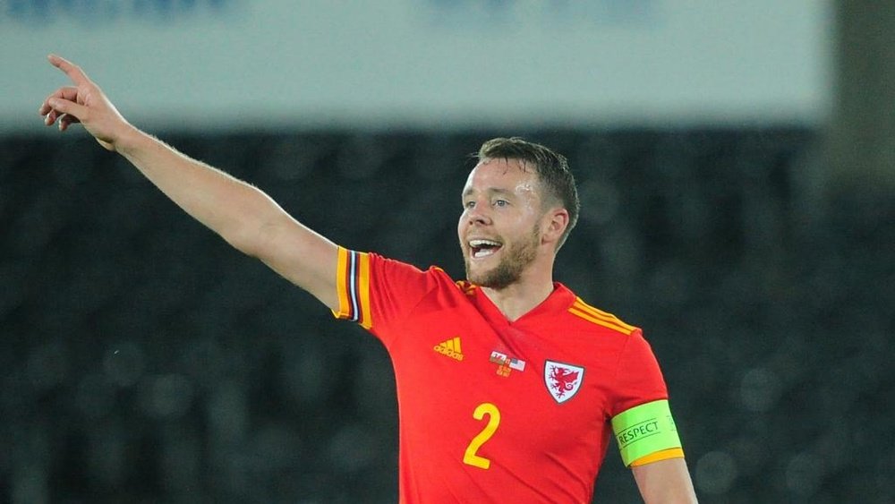 Page hails Wales centurion Gunter as 'a manager's dream'. AFP