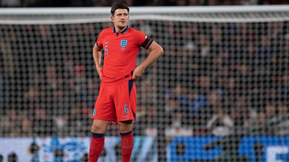 Carragher says Maguire's England place may be untenable. AFP