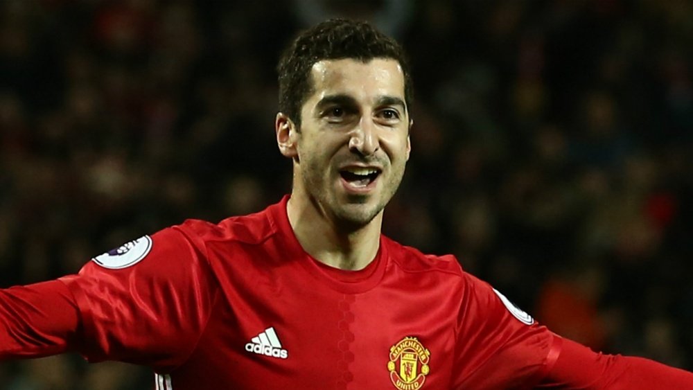 Henrikh Mkhitaryan celebrates scoring for Manchester United. AFP