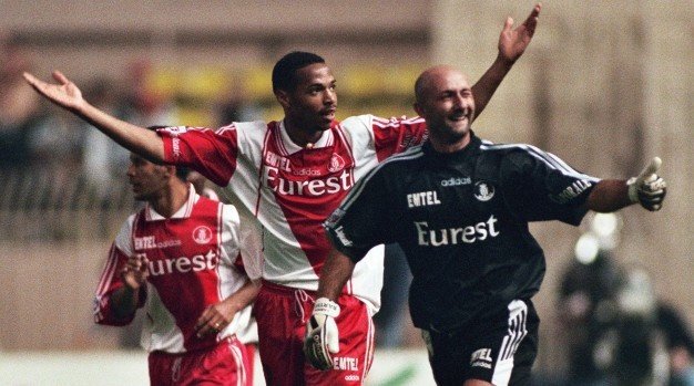Henry (C) went on to play for Arsenal and Barcelona after Monaco. Goal