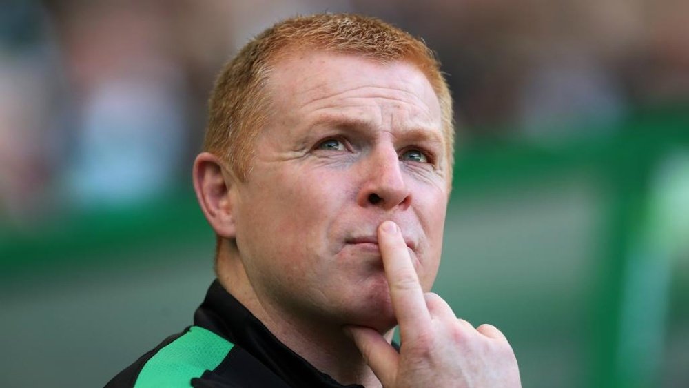 Hibernian manager Neil Lennon was hit by a coin during the match. GOAL