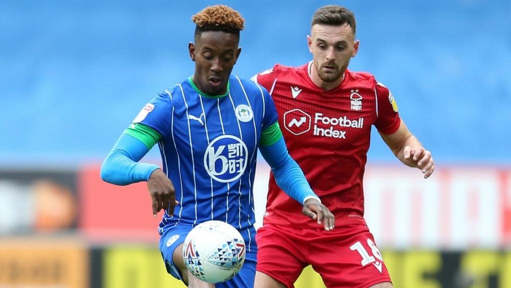 Lowe (L) claimed three crucial points for Wigan. GOAL