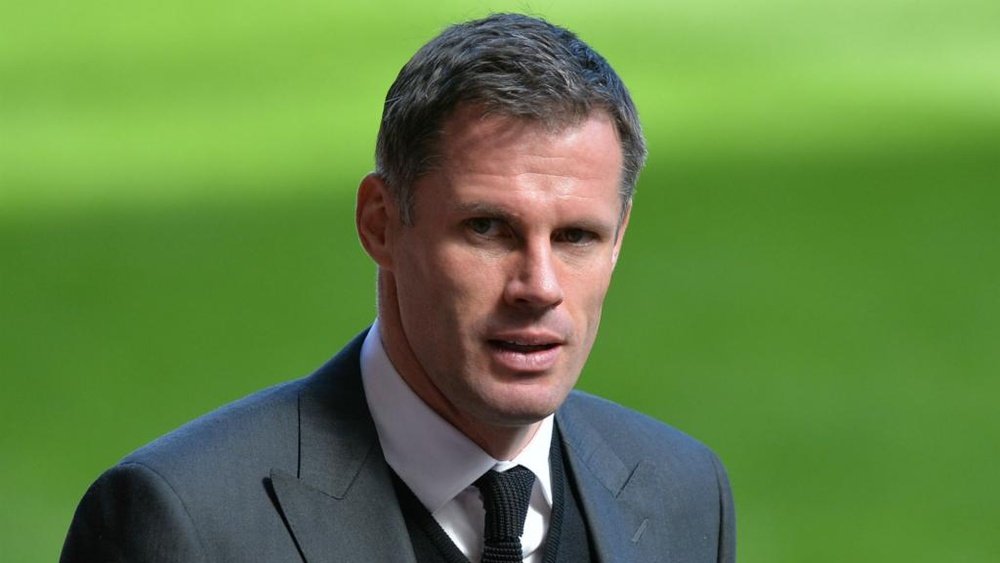 Carragher apologises to Evra