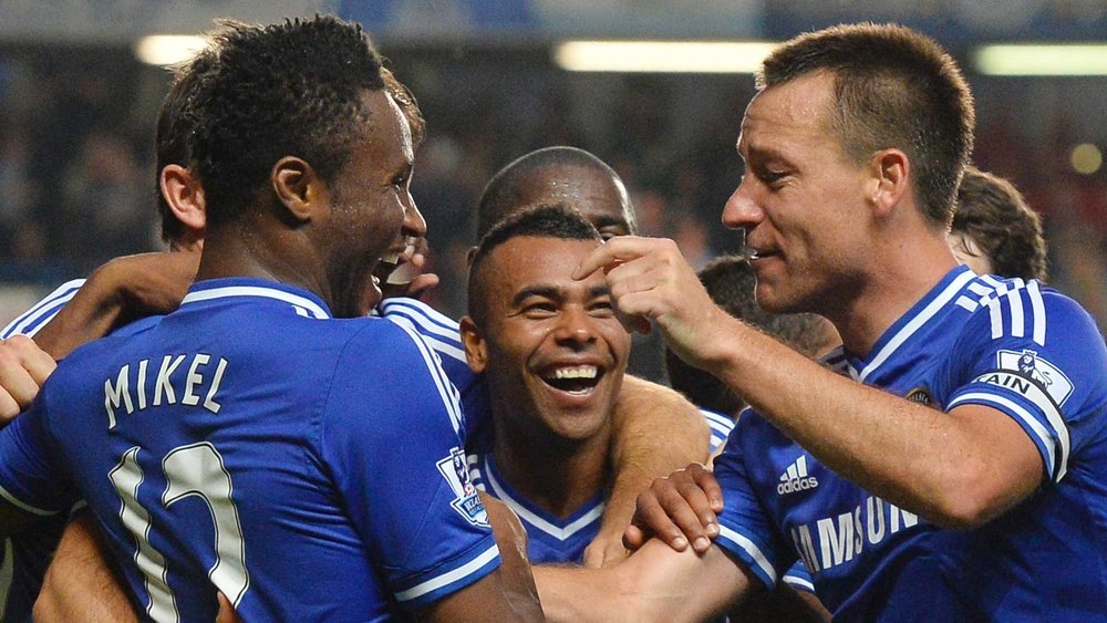 John Obi Mikel (L) celebrates a goal with John Terry. Goal