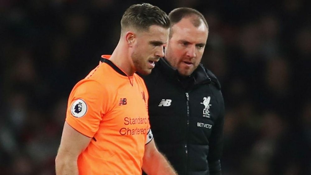 Henderson will miss Liverpool's game with Swansea City on Tuesday. GOAL