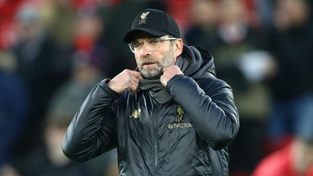 Klopp denies that a trophy would allay pressure on his side. GOAL