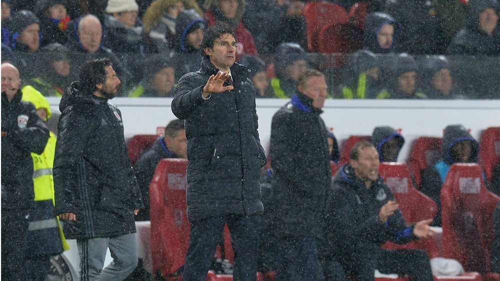 Middlesbrough manager Aitor Karanka giving instructions under the rain. Goal