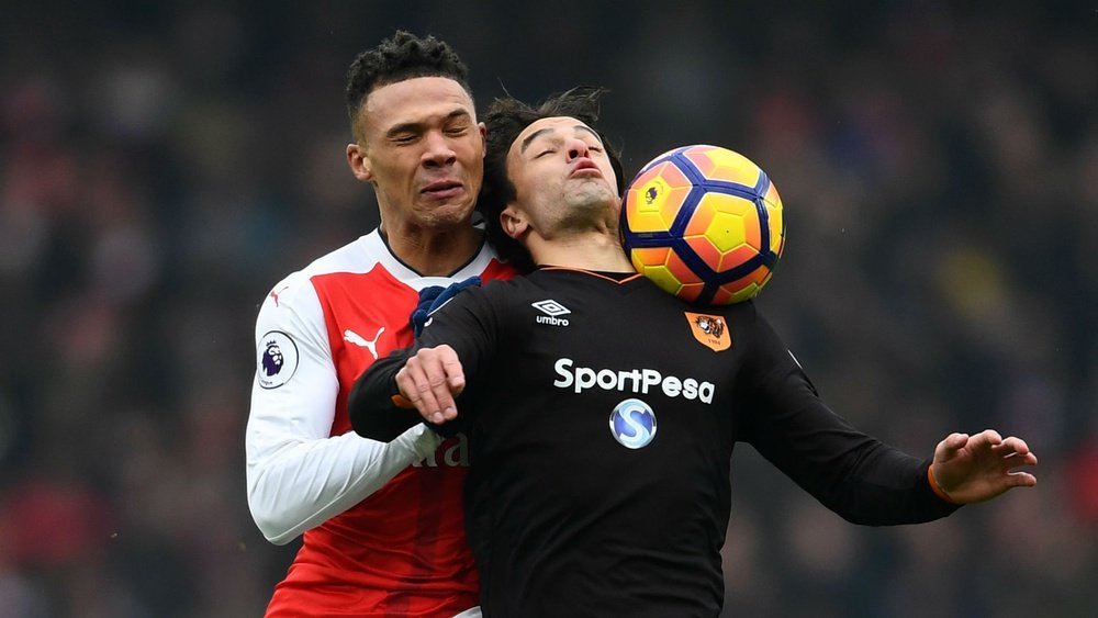 Kieran Gibbs (left) vies with Lazar Markovic. Goal