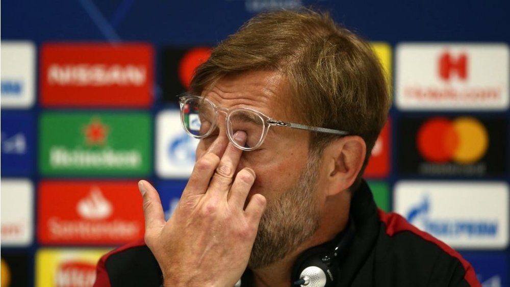 Klopp's side face a daunting task on Tuesday. GOAL