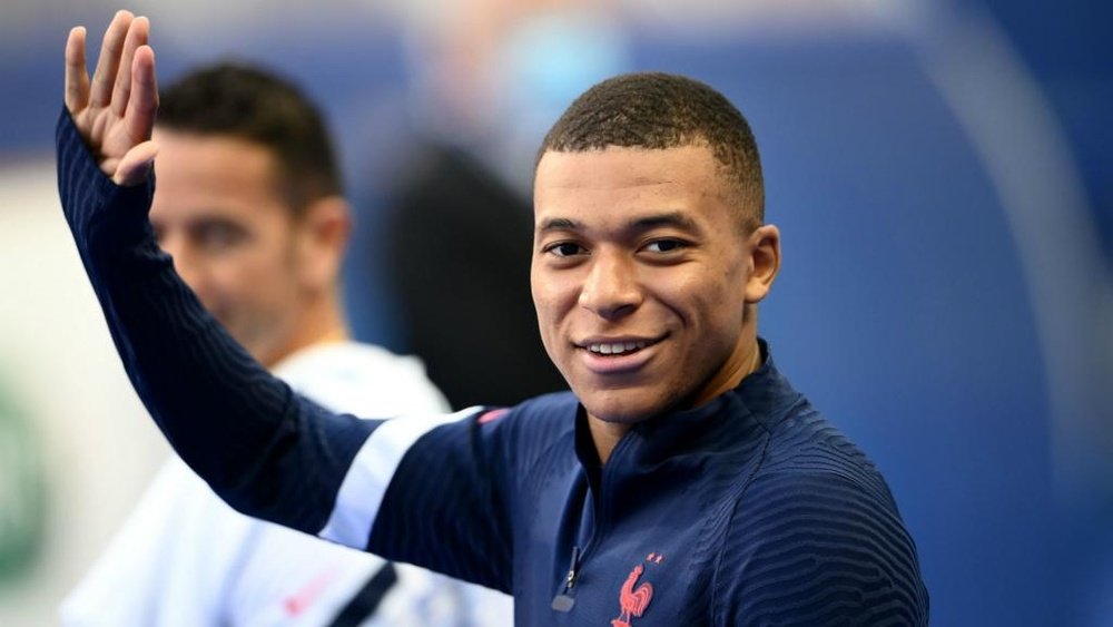 Kylian Mbappe arrives to attend a training session. GOAL